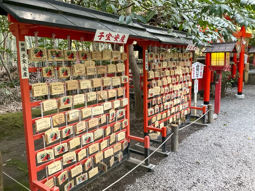 View of a wall of charms at Arashiyama Bamboo Grove