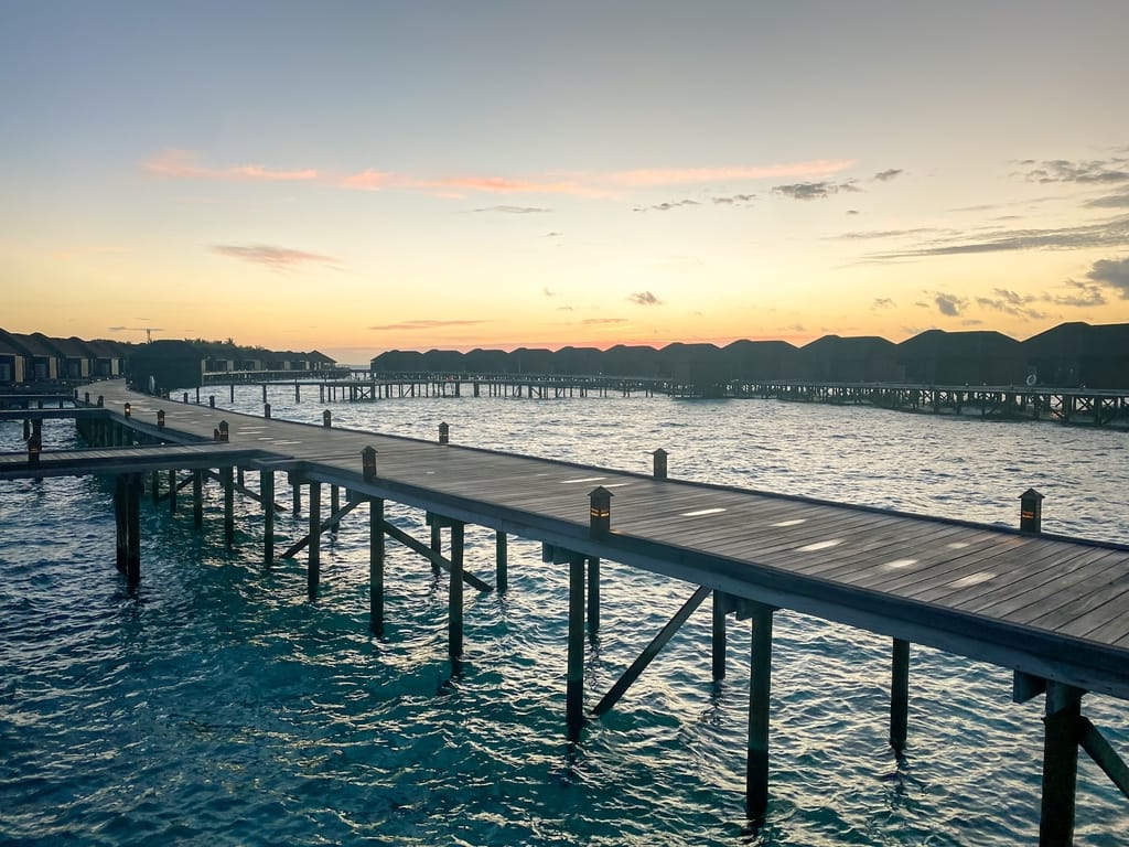 View of the sunset over the water in the Maldives