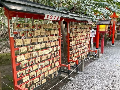 View of a wall of charms at Arashiyama Bamboo Grove 