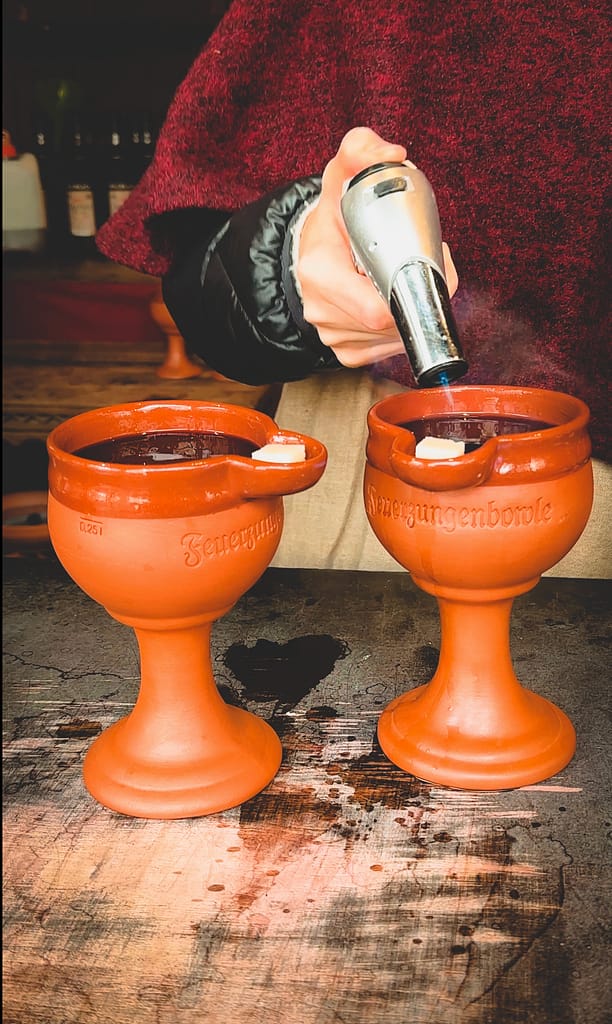 feuerzangenbowle being lit on fire