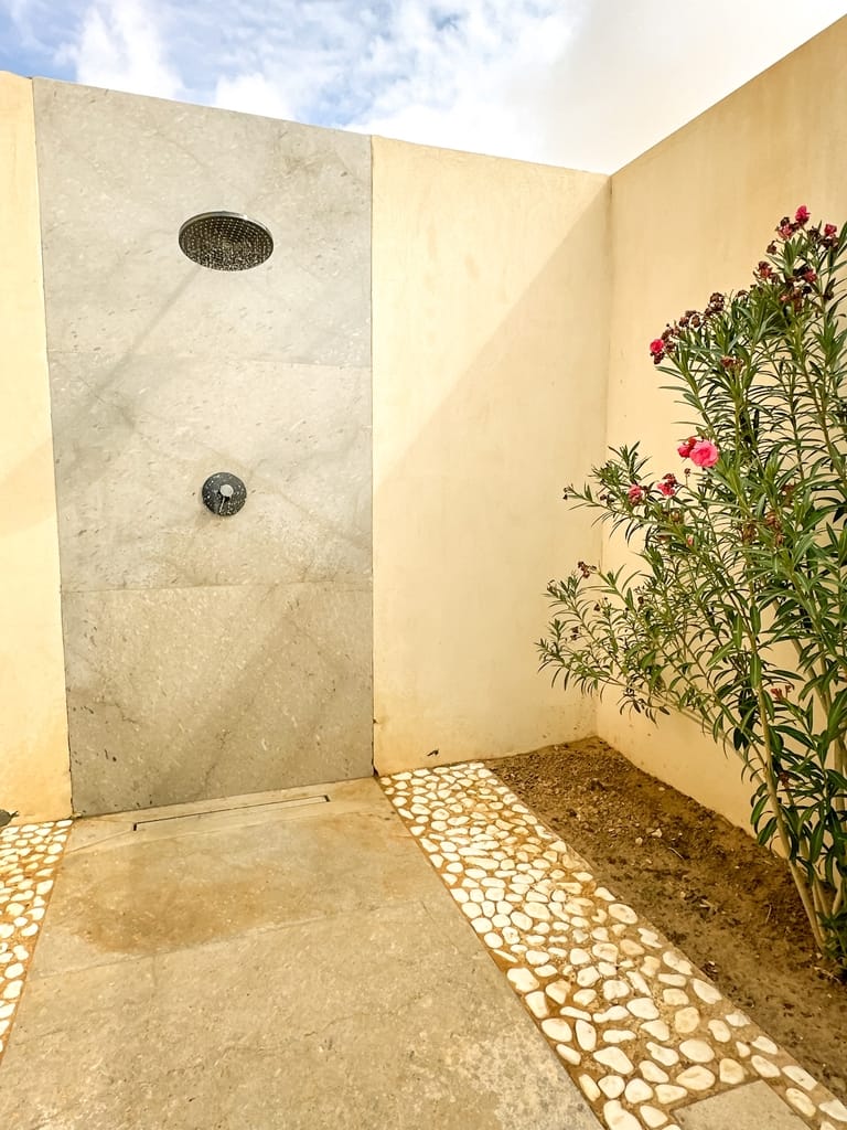 View of the outdoor shower in the in the one-bedroom pool villa