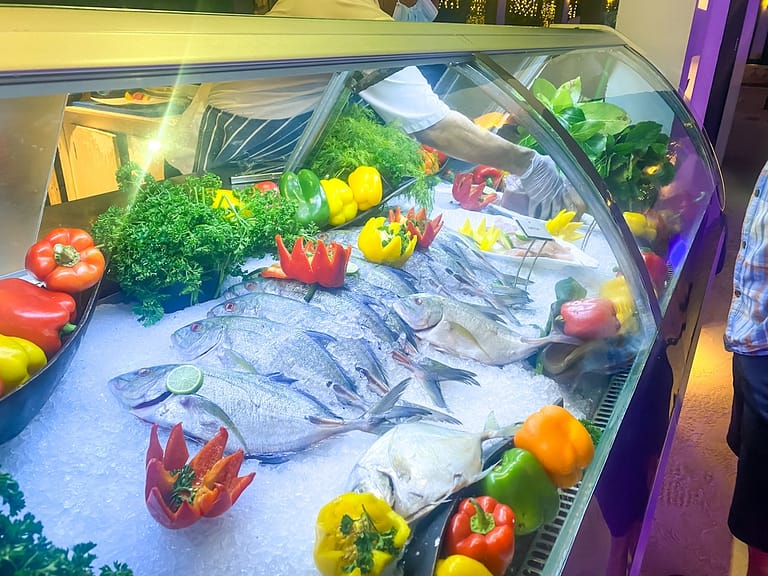 Emperor fish on display in a buffet